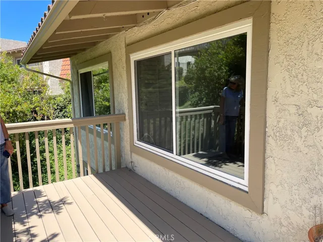 Family room window onto BBQ deck