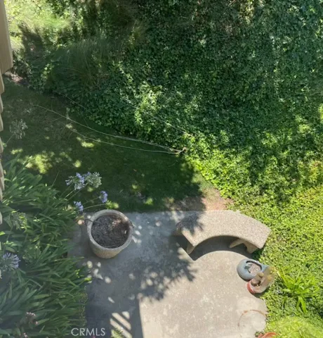 Morning coffee on your private, green spot off Primary bedroom