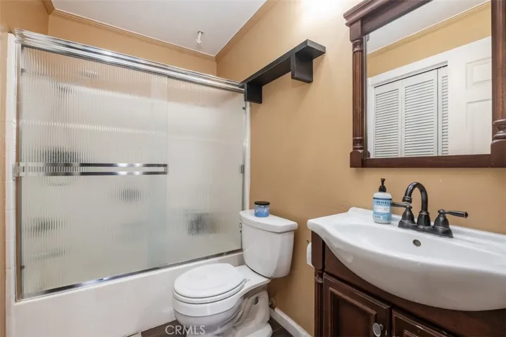 This is a look at the secondary bathroom complete with shower/tub combination