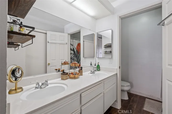 This is a view of the primary bathroom complete with dual sinks
