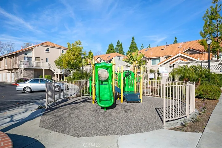 Here is a view of the community tot lot within walking distance of your new home