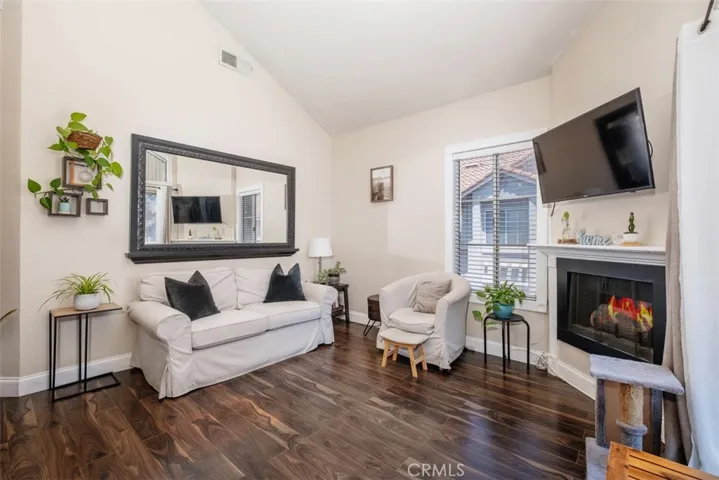This home has lots of natural light and beautiful wood like flooring throughout