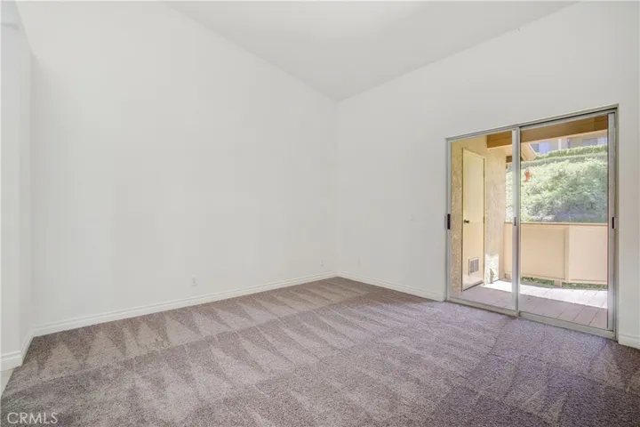 Balcony and laundry room access from Master