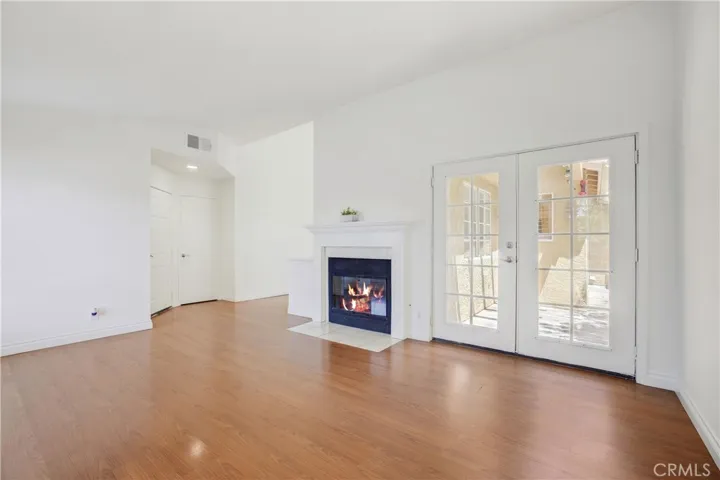 French doors leading to the large private balcony