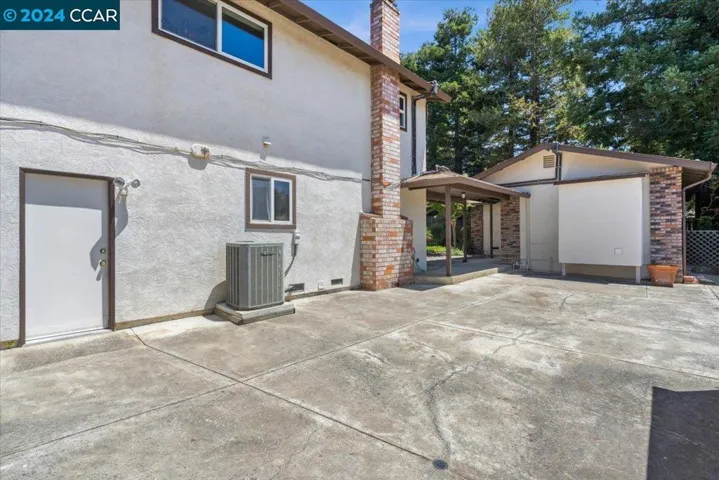 Side yard with garage and ADU access