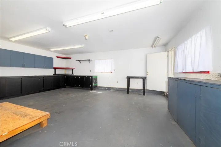 Rear room next to the 2 car garage.