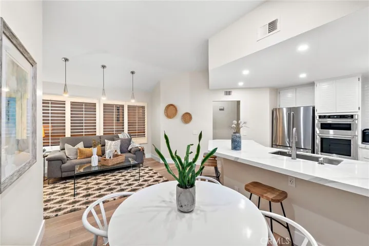 TV Den, Breakfast Nook plus an Open Kitchen with Sit Down Bar Seating.