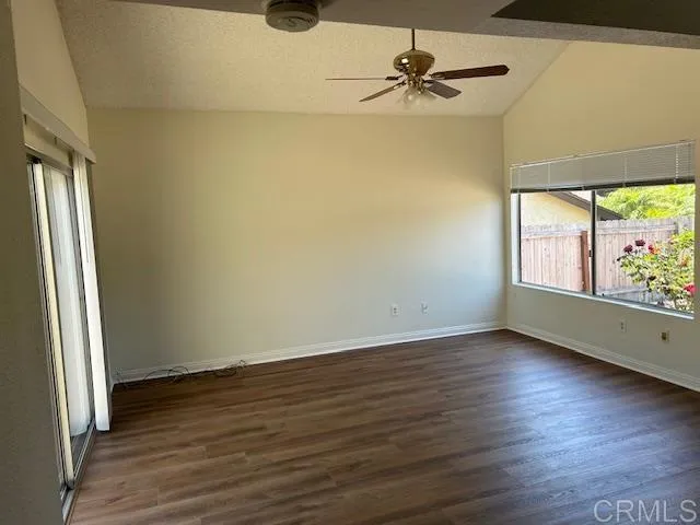 Living room with vaulted ceilings