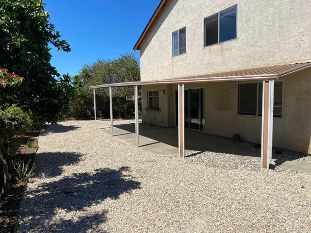 full length patio in backyard