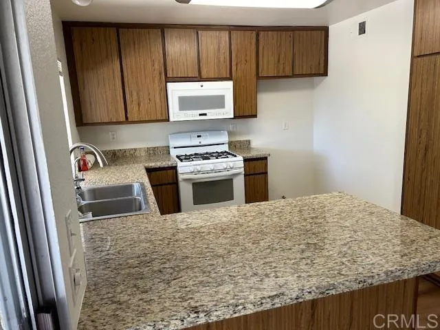 Kitchen with granite counters