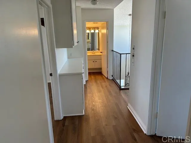 upstairs hallway looking to bedrooms and bath
