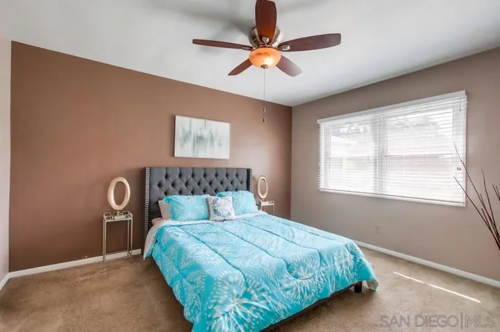 Lovely primary bedroom with more beautiful light!