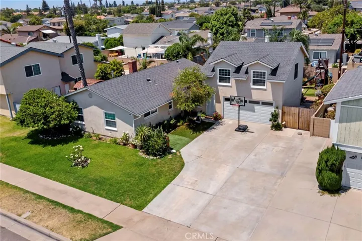 3 bedrooms and 1 3/4 bathrooms in the single level part of the house.  Bonus room that was converted to a mother-in-laws unit is over the garage.