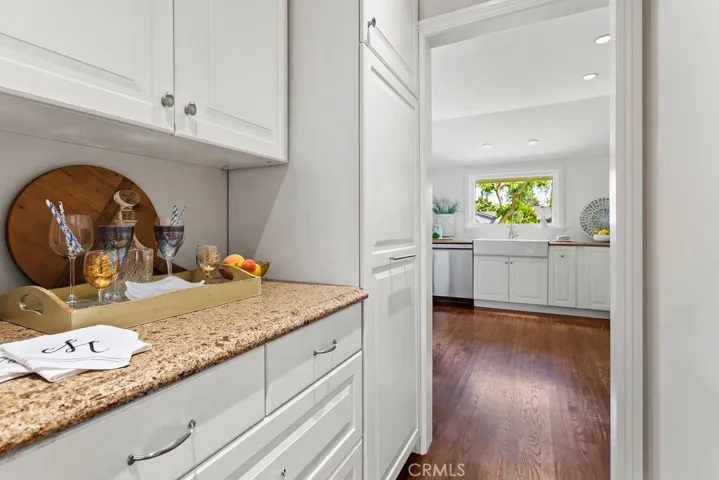 Pantry area with additional storage and countertop space