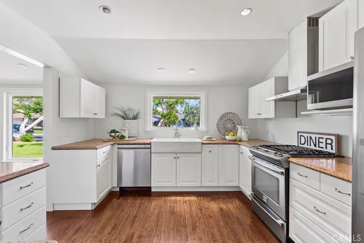 A charming kitchen with farmhouse sink and tons of cabinets for the most discerning chef...