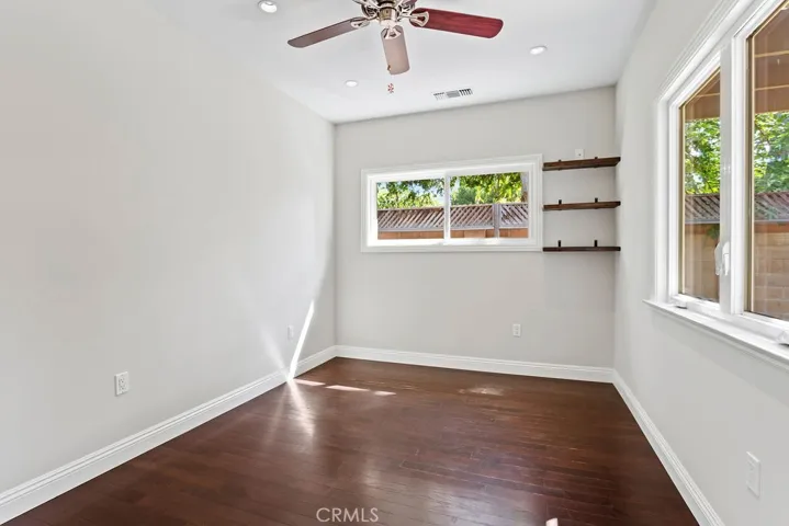 The fourth bedroom is located off the family room in a separate wing