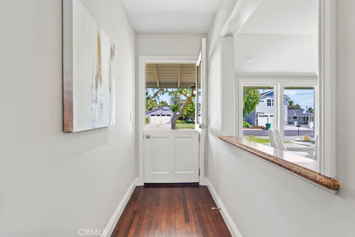 The charming front Dutch-Door allows you to invite the outside in