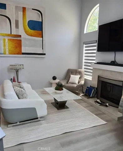 Living Room with Marble Fireplace