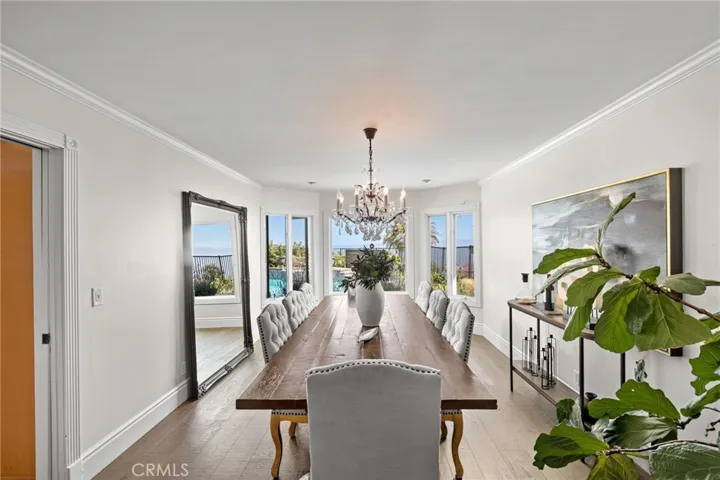 The formal dining room is a gorgeous setting with ocean views.