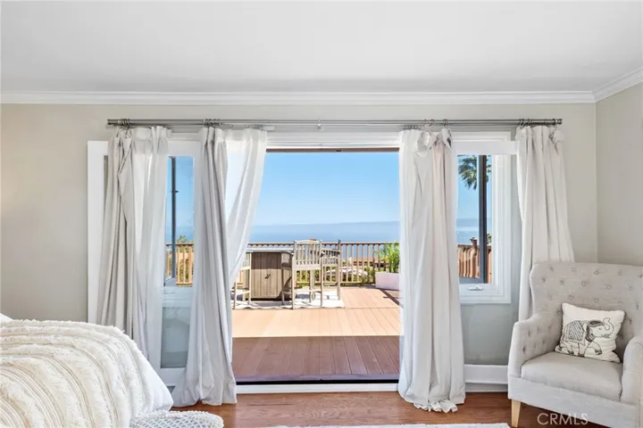 French doors open to a massive Trex sun deck. Here, you'll be captivated by jaw-dropping views of Catalina Island.