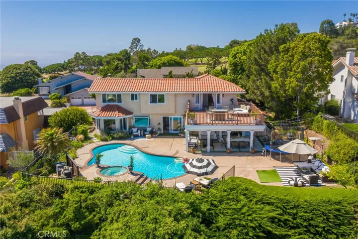 Sprawling 10,000+ sq ft lot in the prestigious Rancho Palos Verdes, this stunning 4-bedroom, 3-bathroom home with a bonus room offers unparalleled 180-degree ocean views.