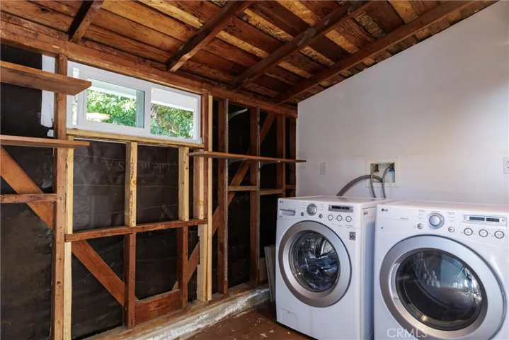 Exterior laundry room allows more functional room in the home. Plumbed with 3/4 PEX for possible conversion to bathroom