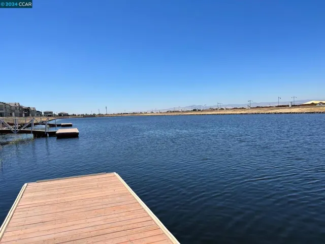 Located right on the lake, this is the view from your semi-private dock. Fishing, Paddle Boarding!