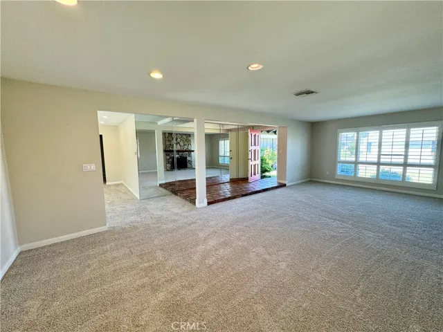 C’mon in. This home has been lovingly maintained through the years. New windows, new carpeting, fresh paint, top of the line plantation shutters, new appliances and more will be found throughout this property.