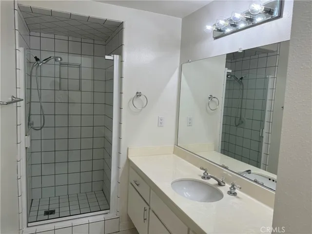 There is a large vanity area in the primary bathroom.