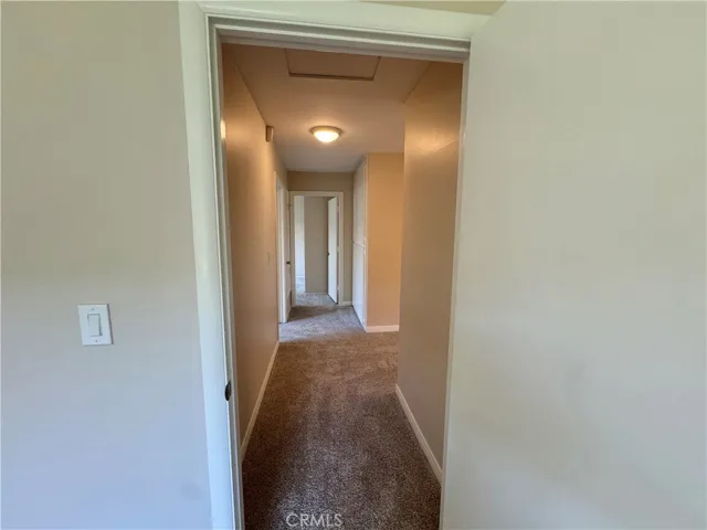The hall with the three secondary bedrooms.
