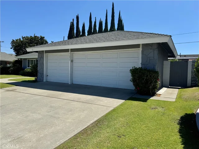 This home includes a three car garage.