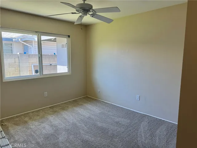 Bedroom #2 has a ceiling fan and as in the rest of the home, the windows are about to be replaced.