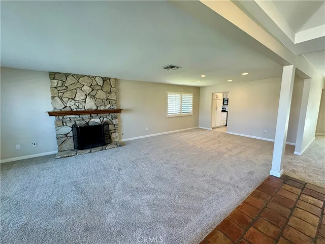 The large living room, dining room area, as you enter the home.