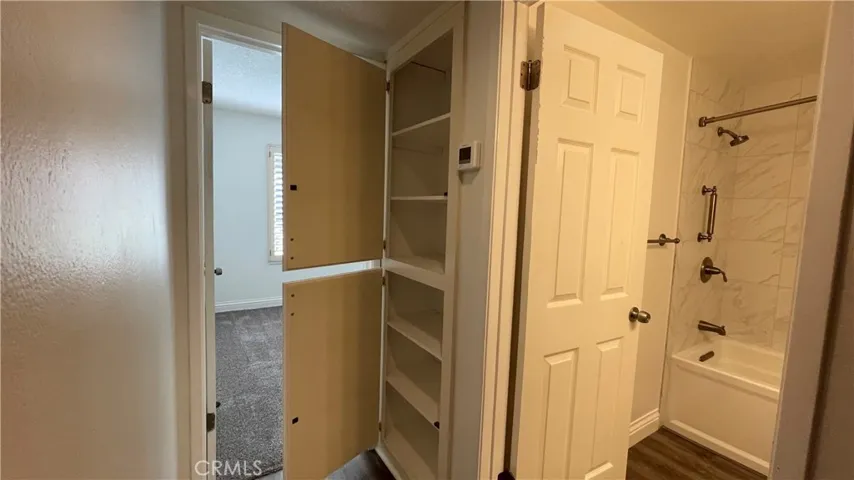 Hall linen closet and second bathroom