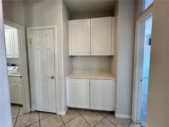 Hallway to Primary BR and Laundry