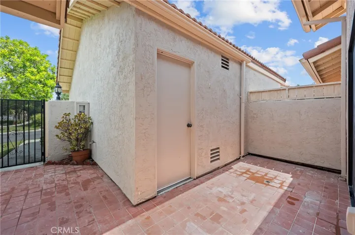 Front courtyard - door going into garage