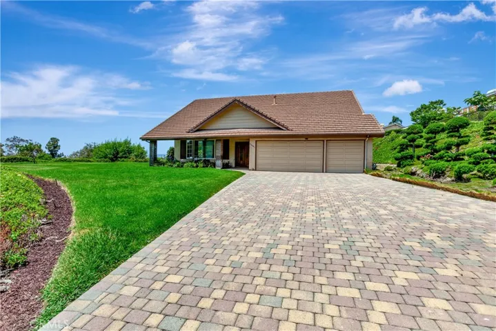 Over 16,000 sq. ft. Lot with Paverstone Driveway