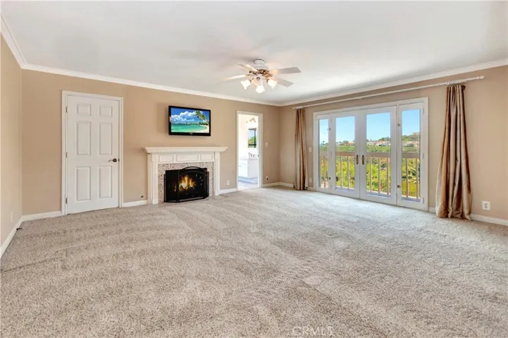 Generous Primary Bedroom with Ocean & Canyon Views from Balcony