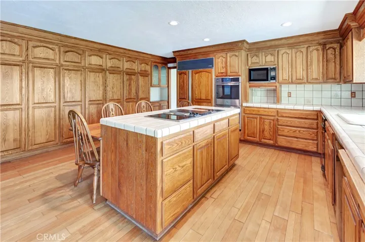 Island Kitchen with Terrific Workspaces and Lots of Cabinetry