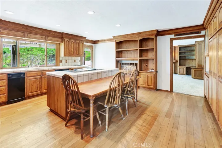 Wall Between Kitchen & Adjoining Family Room Has Been Opened Up by Owners of Same Floorplan to Create Open Concept Kitchen/Family Room