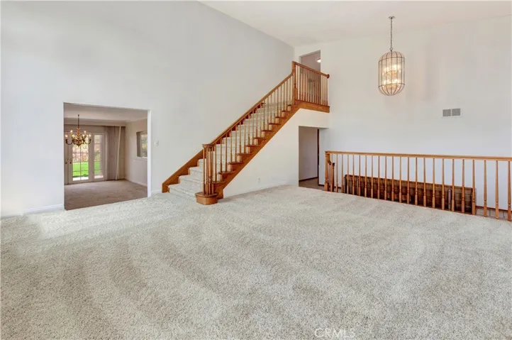 Living Room with Formal Dining Room to Left