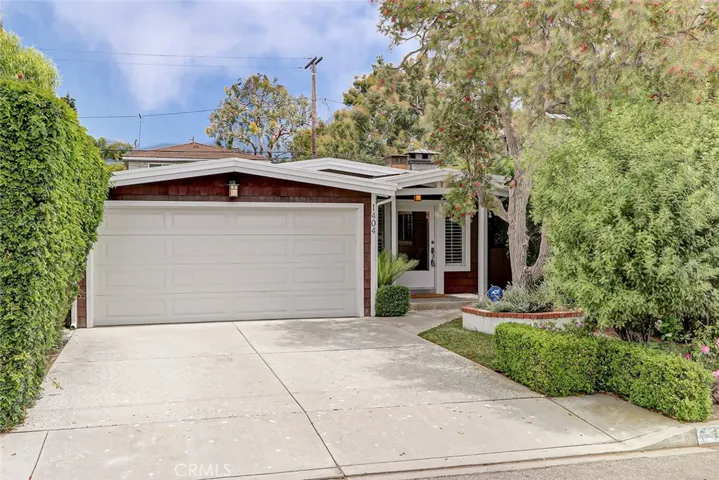 Exterior Front Yard Area, Driveway, 2-Car Attached Garage, and Front Door Entry