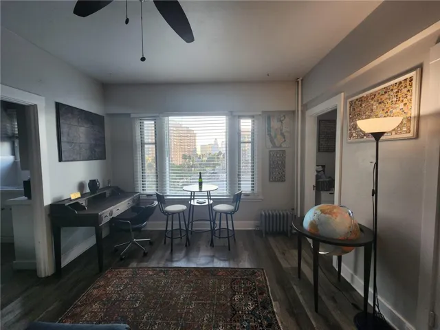 This studio has room for a king size bed, a desk & office space.