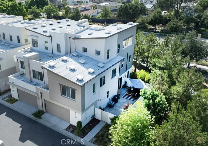 Large corner lot surrounded by trees