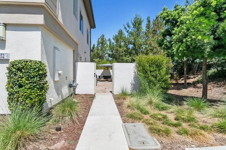 Convenient side gate access to the home due to unique corner location