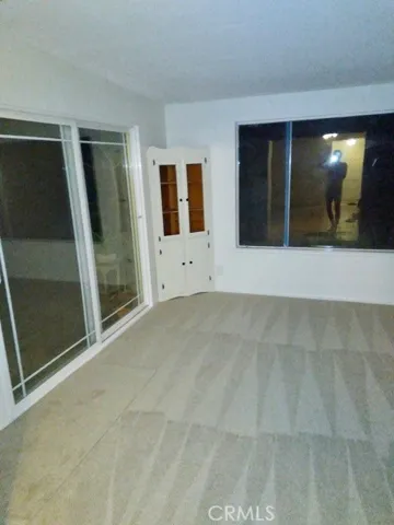 Bonus room with access to the large backyard, that is not the agent in the photo.
