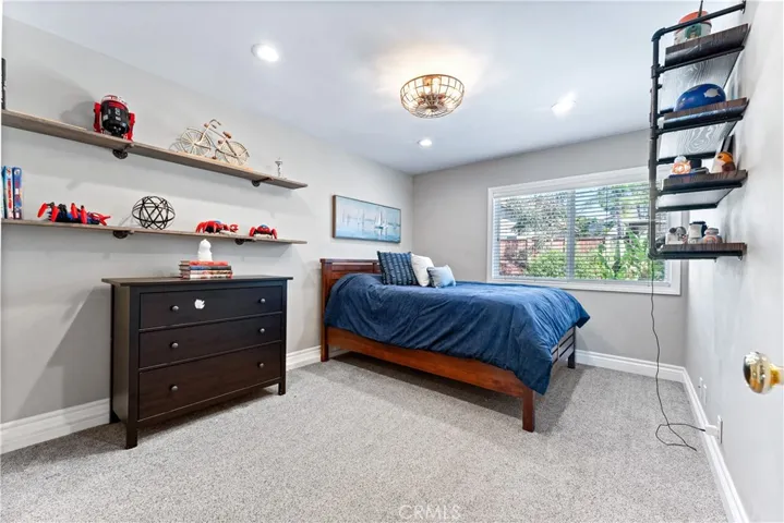 2nd bedroom upstairs with walk-in closet