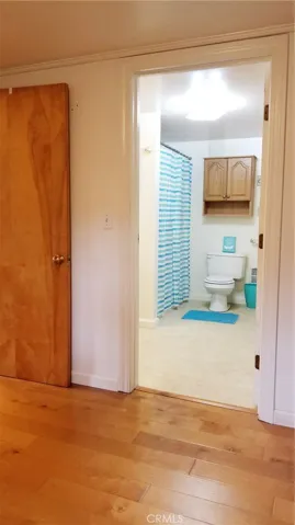 From bedroom into bathroom.