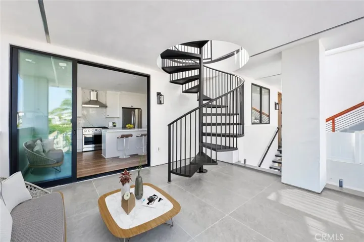 Indoor Outdoor living on your private patio that has a Panoramic Ocean view Photo has been virtually staged