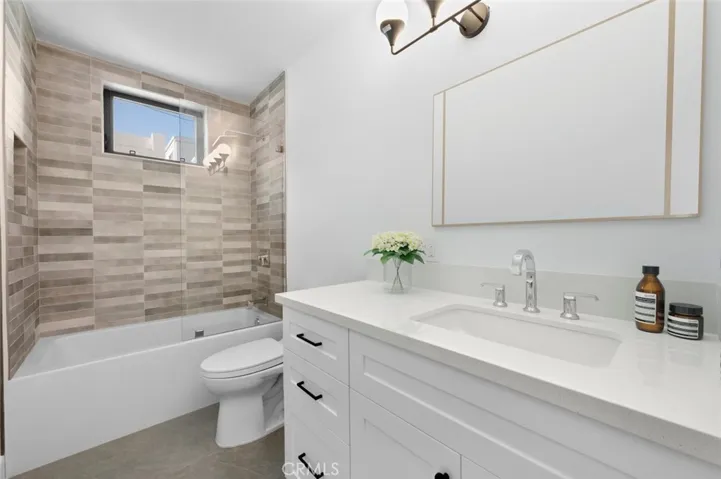 2nd Bathroom with gorgeous tile and a bathtub